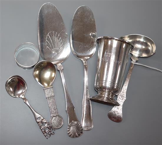 A Norwegian white metal small vase, two similar servers, a napkin ring, two small spoons and a ladle.